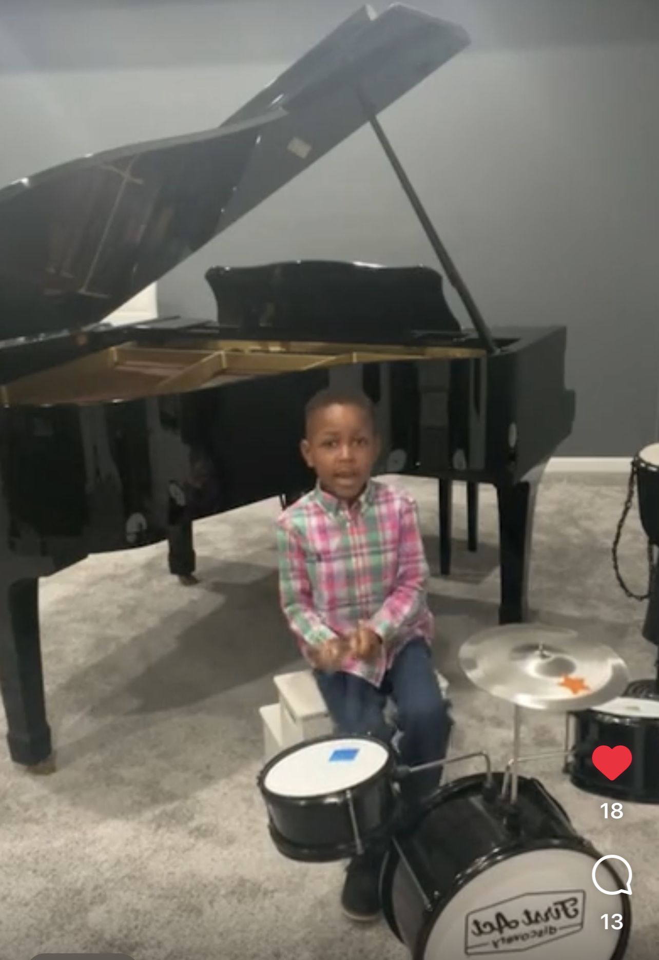 Kevin Andre singing and playing drums at Dana Rice Music's FAME Studio