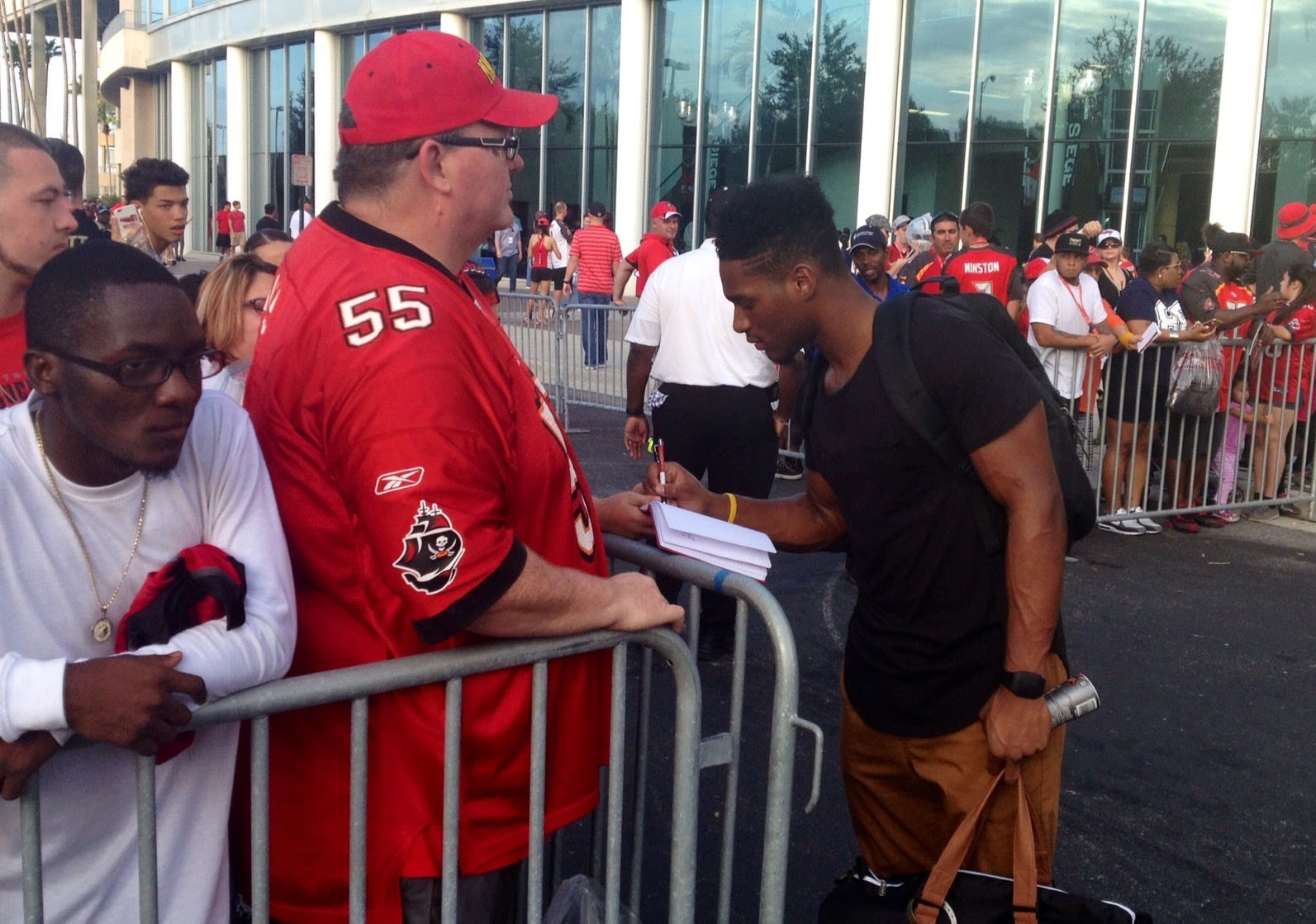 Photo of NFL Player, Kimario McFadden signing autographs